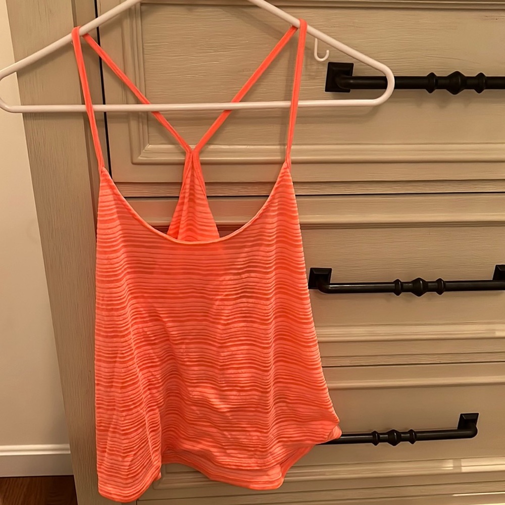Coral lightweight tank size Large. Worn twice.